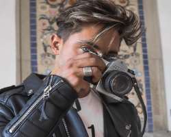 Roman is also interested in photography alongside modeling.